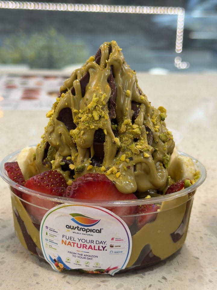 Açaí soft serve with pistachio sauce, strawberries and banana at our Sydney café.