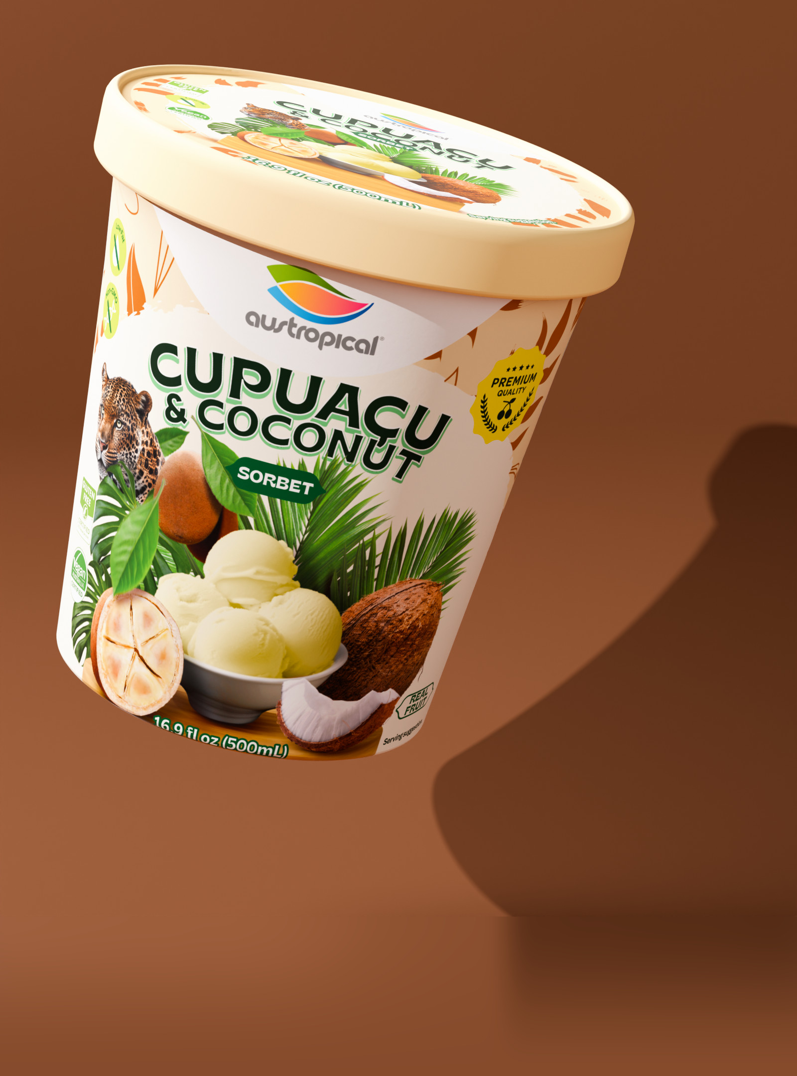 Austropical Cupuaçu & Coconut sorbet pint floating on a cocoa brown background, its shadow cast on the wall behind it.