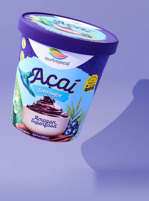 Austropical Açaí Zero Sugar closed pint with its lid visible, on a colored background with a curved shadow